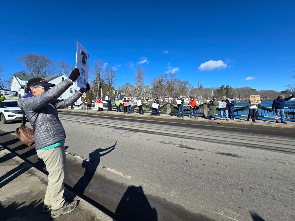 Indivisible Lincoln County Maine, February 26, 2025 on the Newcastle-Damariscotta bridge.  Protesters lined both sides for a surrounding effect.